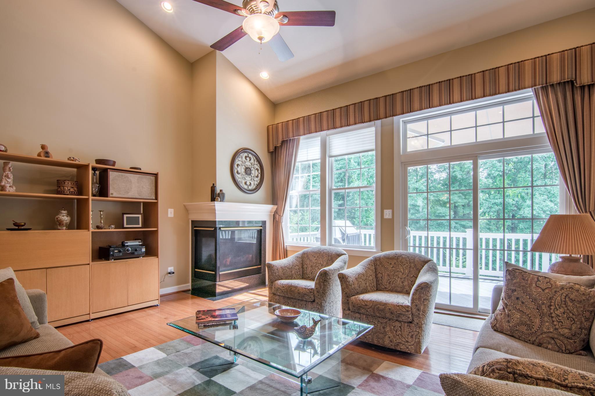 8427 Meadowsweet Road Baltimore, MD 21208 - Photo 15 of 30 LIVING ROOM W/ GAS FIREPLACE & SLIDERS TO DECK