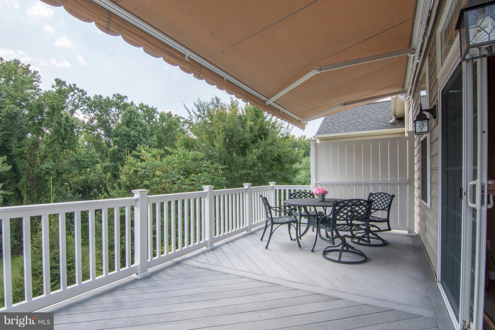 8427 Meadowsweet Road Baltimore, MD 21208 - Photo 16 of 30 REAR DECK W/ RETRACTABLE AWNING