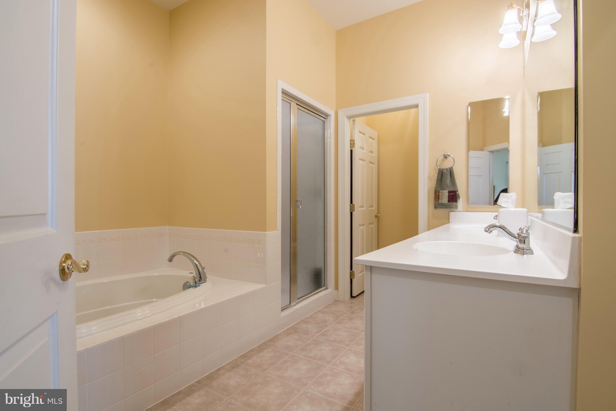 8427 Meadowsweet Road Baltimore, MD 21208 - Photo 19 of 30 MASTER BATH W/ SOAKING TUB & SEPARATE SHOWER