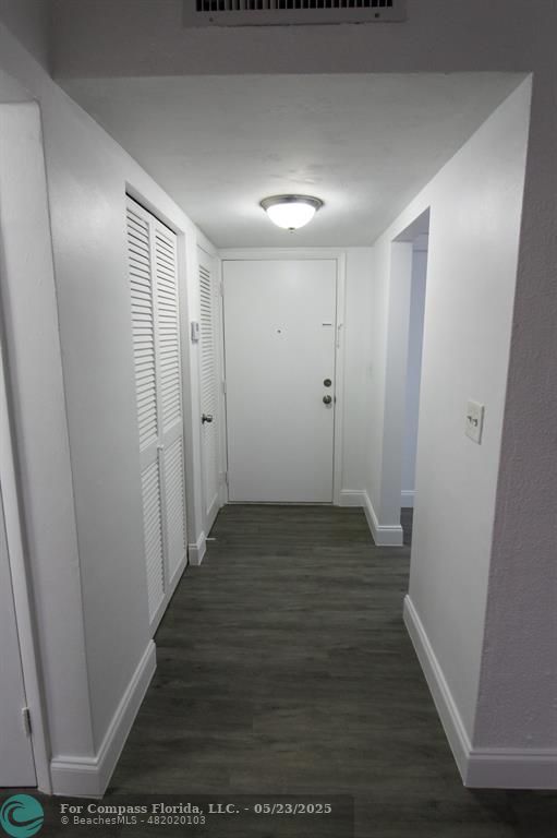 9159 Southwest 77th Avenue, Unit 411 Miami, FL 33156 - Photo 6 of 18 a view of a hallway