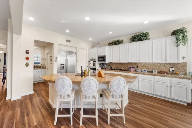 a bedroom with two beds and painted walls