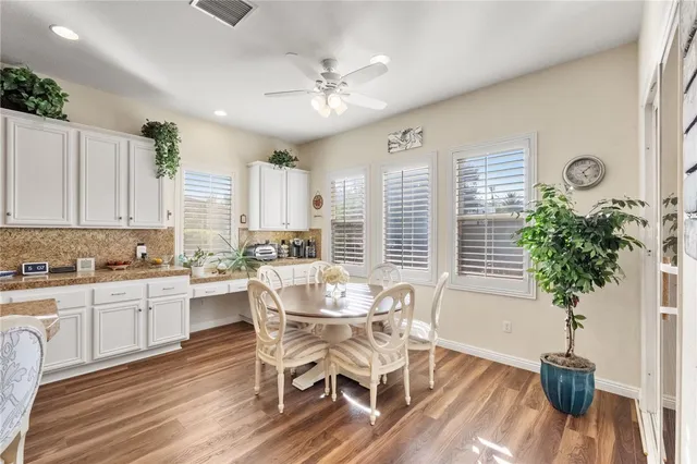 a utility room with sink dryer and washer