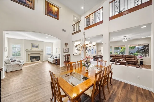 a living room with furniture fireplace and window