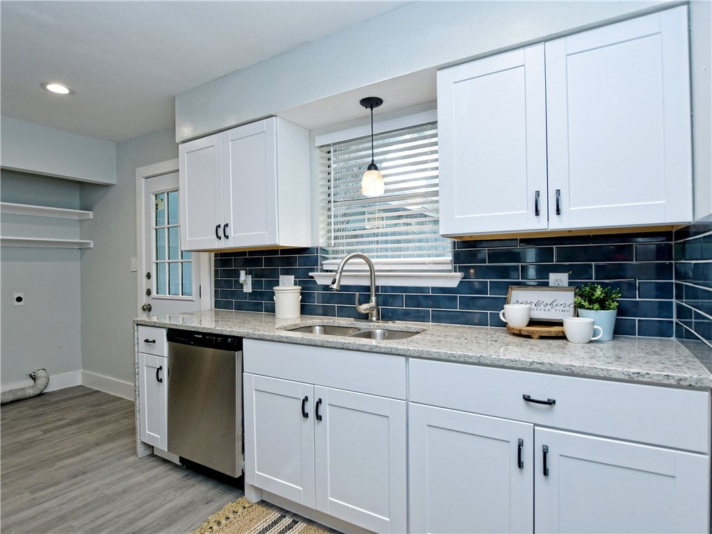 1804 Matthews Lane, Unit B Austin, TX 78745 - Photo 1 of 1 Brand new cabinets, designer backsplash, granite countertops.