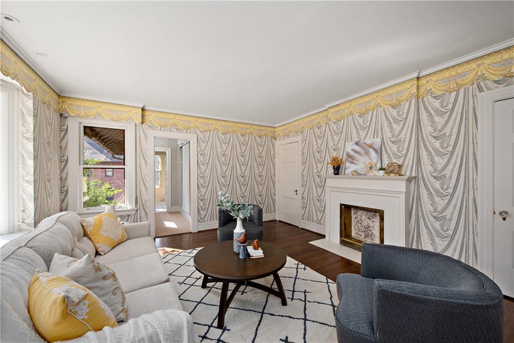 1045 Devon Road Pittsburgh, PA 15213 - Photo 15 of 25 a living room with furniture and a fireplace