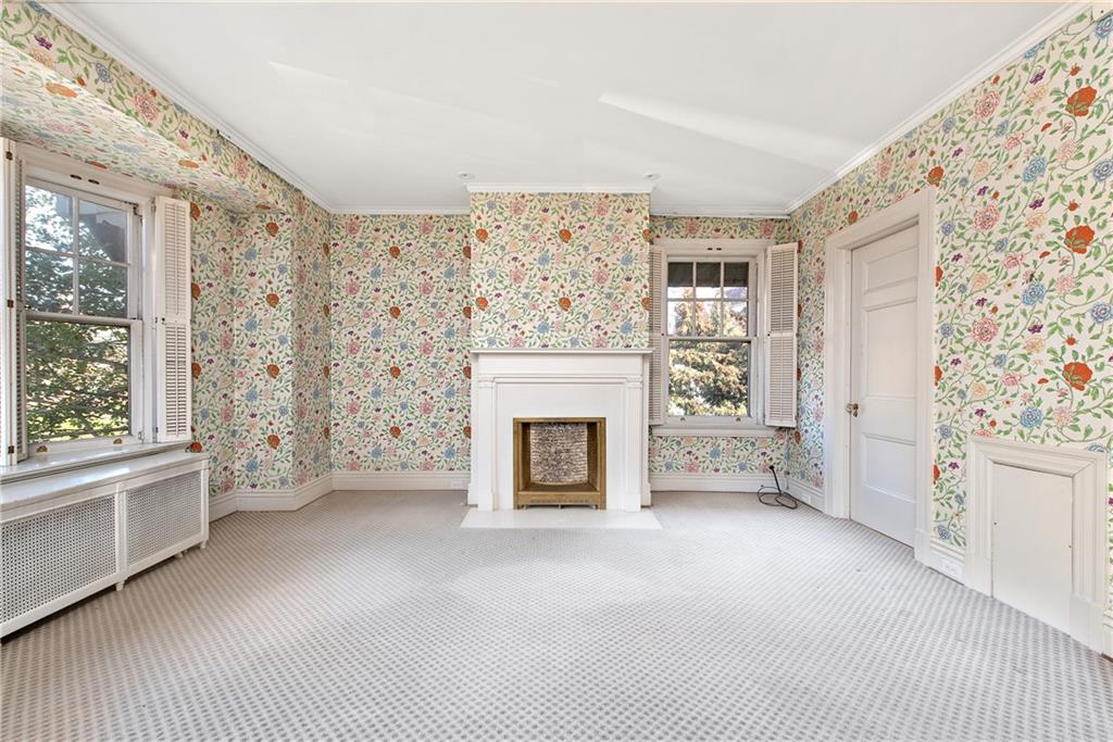 1045 Devon Road Pittsburgh, PA 15213 - Photo 23 of 25 a view of a livingroom with an empty space and a fireplace