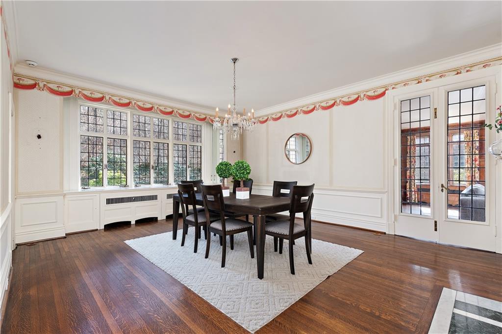 1045 Devon Road Pittsburgh, PA 15213 - Photo 8 of 25 a view of a dining room with furniture window and wooden floor