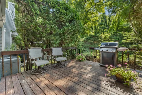 a view of a chairs and table on the wooden floor