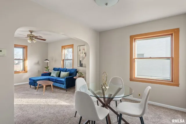a living room with furniture and window