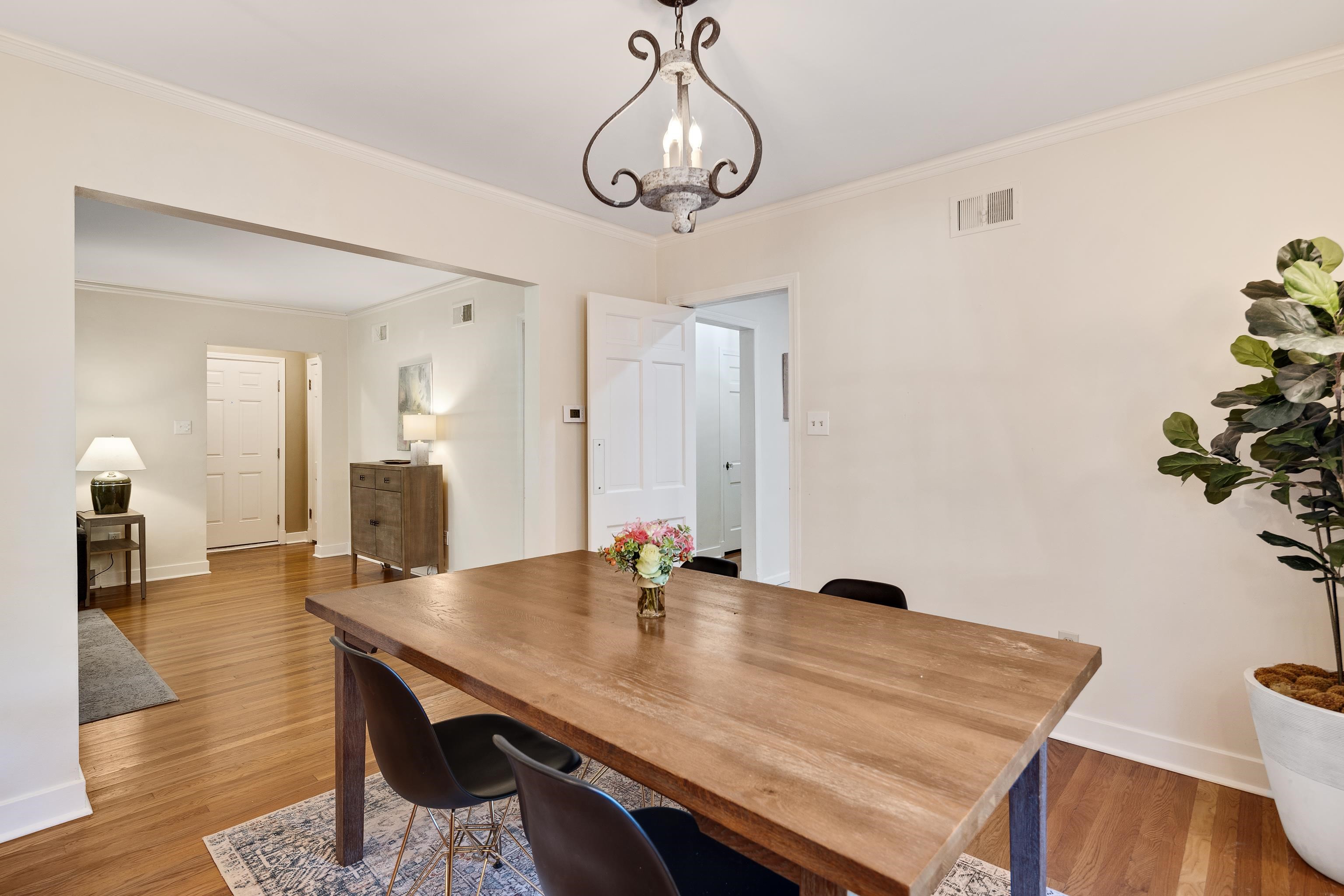 73 North Goodlett Street Memphis, TN 38117 - Photo 11 of 36 a view of a dining room with a table and chairs