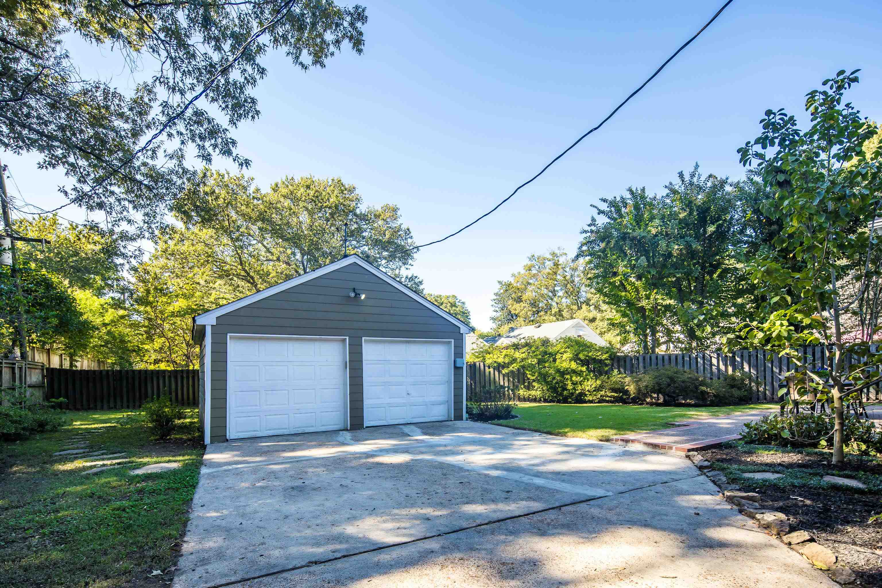 73 North Goodlett Street Memphis, TN 38117 - Photo 33 of 36 a front view of house with yard and trees