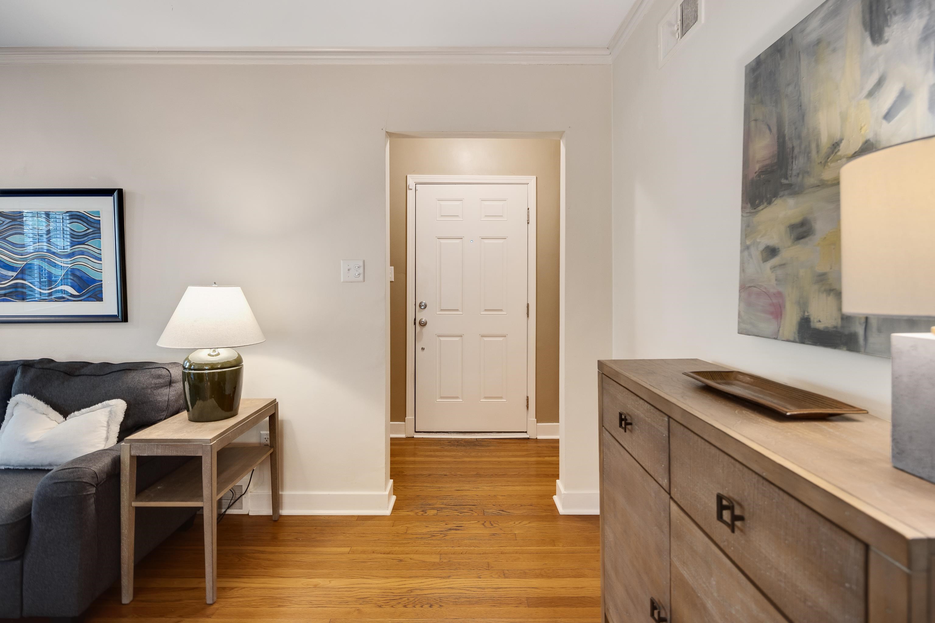 73 North Goodlett Street Memphis, TN 38117 - Photo 5 of 36 a kitchen with stainless steel appliances granite countertop a stove and a refrigerator