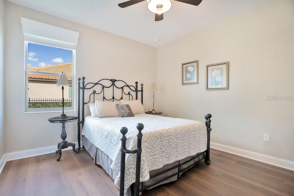 805 Riviera Bella Drive DeBary, FL 32713 - Photo 44 of 86 a bedroom with a bed and window