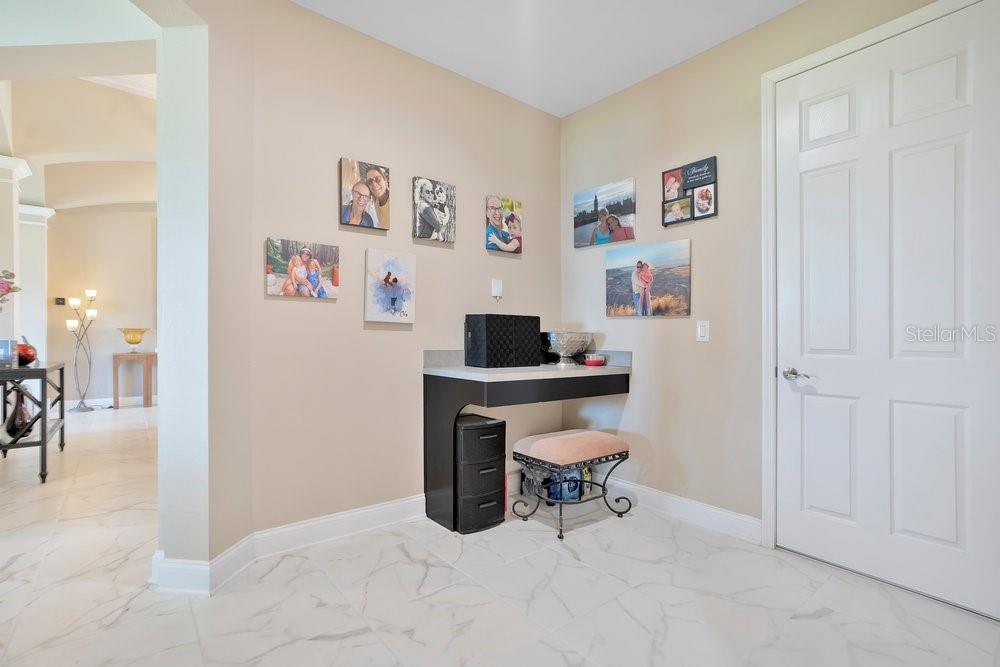 805 Riviera Bella Drive DeBary, FL 32713 - Photo 49 of 86 a workspace with furniture and desk