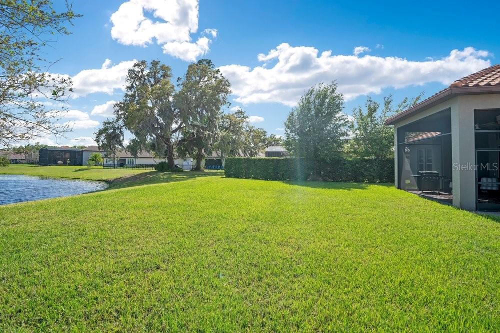 805 Riviera Bella Drive DeBary, FL 32713 - Photo 55 of 86 a view of a house with a backyard