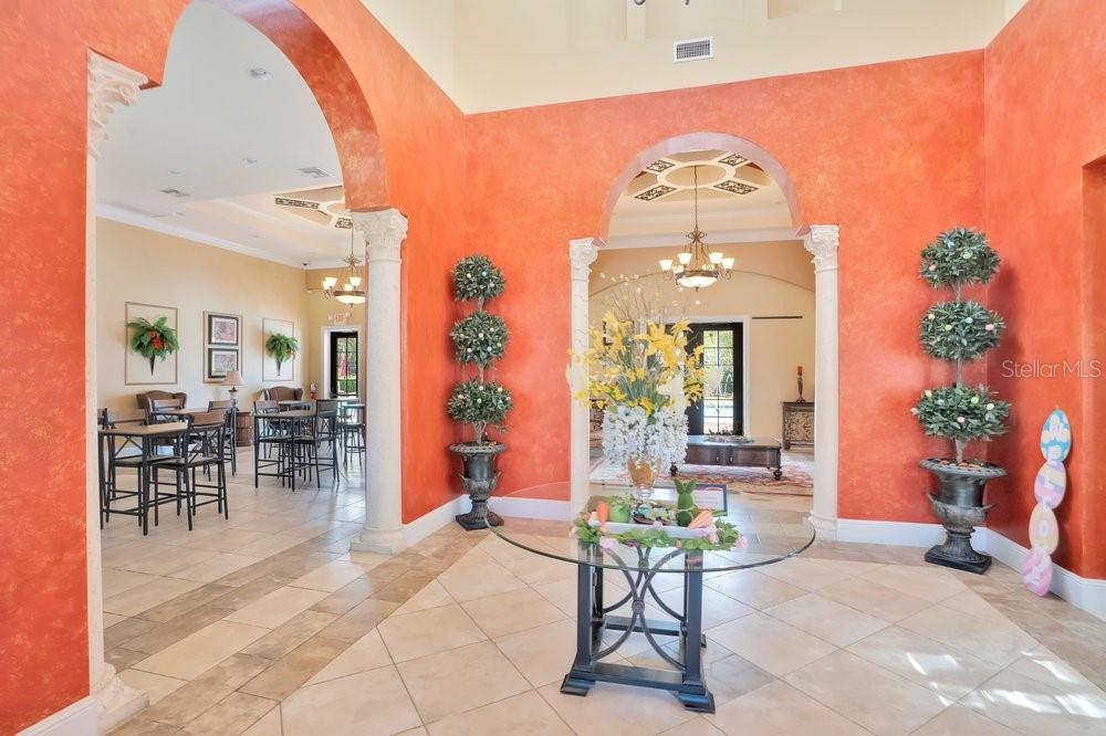 805 Riviera Bella Drive DeBary, FL 32713 - Photo 70 of 86 a view of a dining room with furniture and a potted plant
