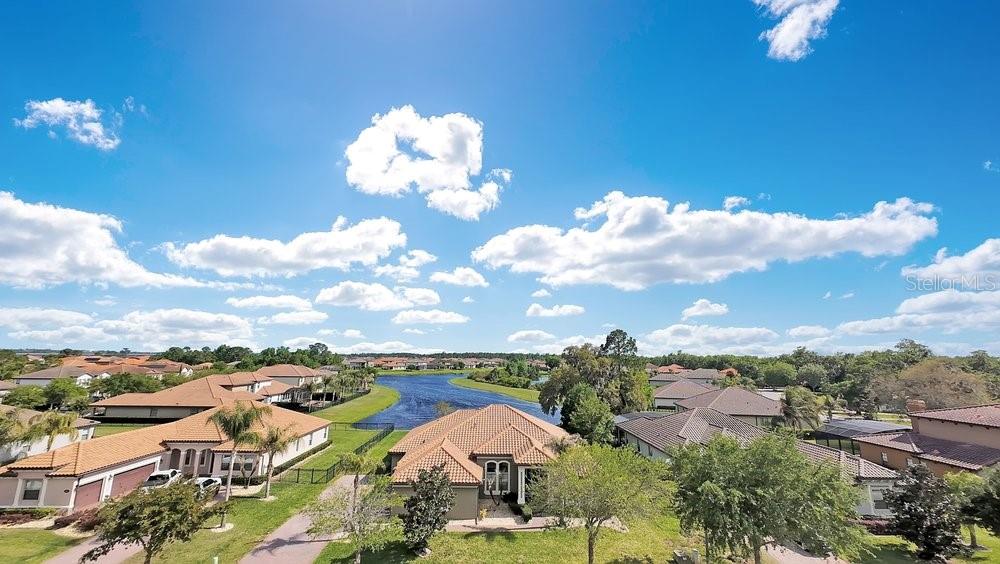 805 Riviera Bella Drive DeBary, FL 32713 - Photo 77 of 86 a view of a lake with outdoor space