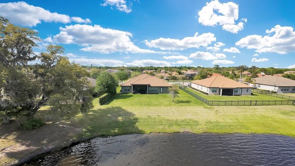 805 Riviera Bella Drive DeBary, FL 32713 - Photo 79 of 86 a view of a house with a big yard