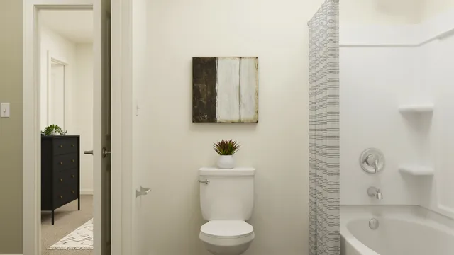 a bathroom with a toilet and a sink