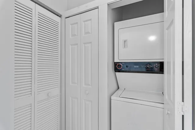 a close view of a utility room with washer and dryer