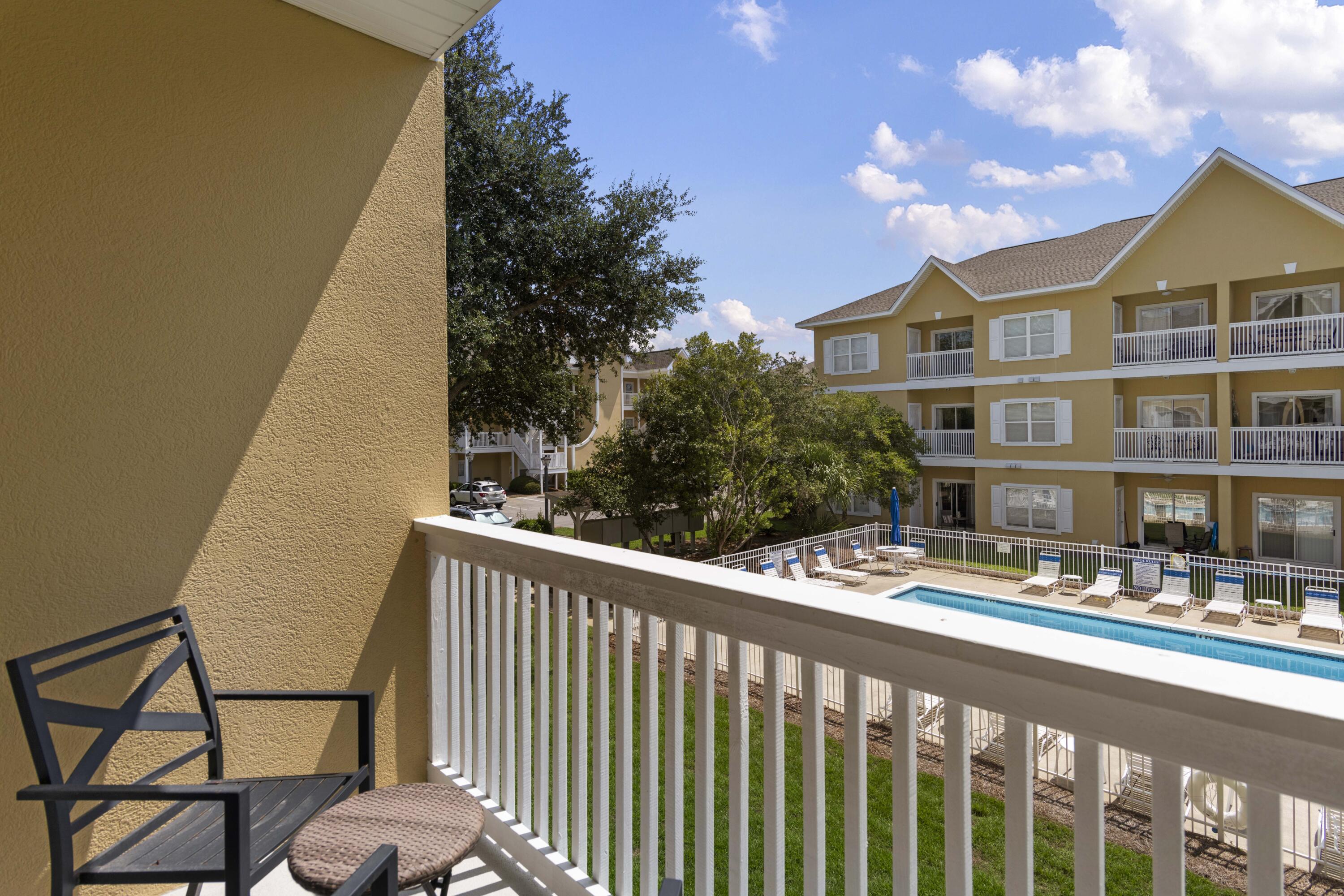 34 Heron's Watch Way, Unit 2202 Santa Rosa Beach, FL 32459 - Photo 3 of 29 a balcony view with a seating space