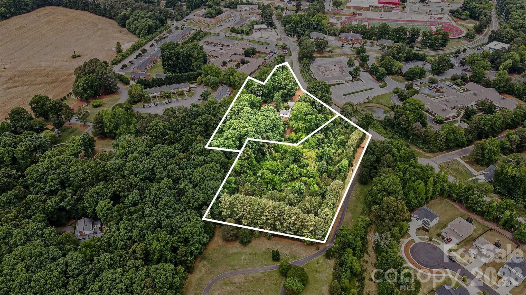 1116 Medlin Road Monroe, NC 28112 - Photo 2 of 40 an aerial view of house with a yard