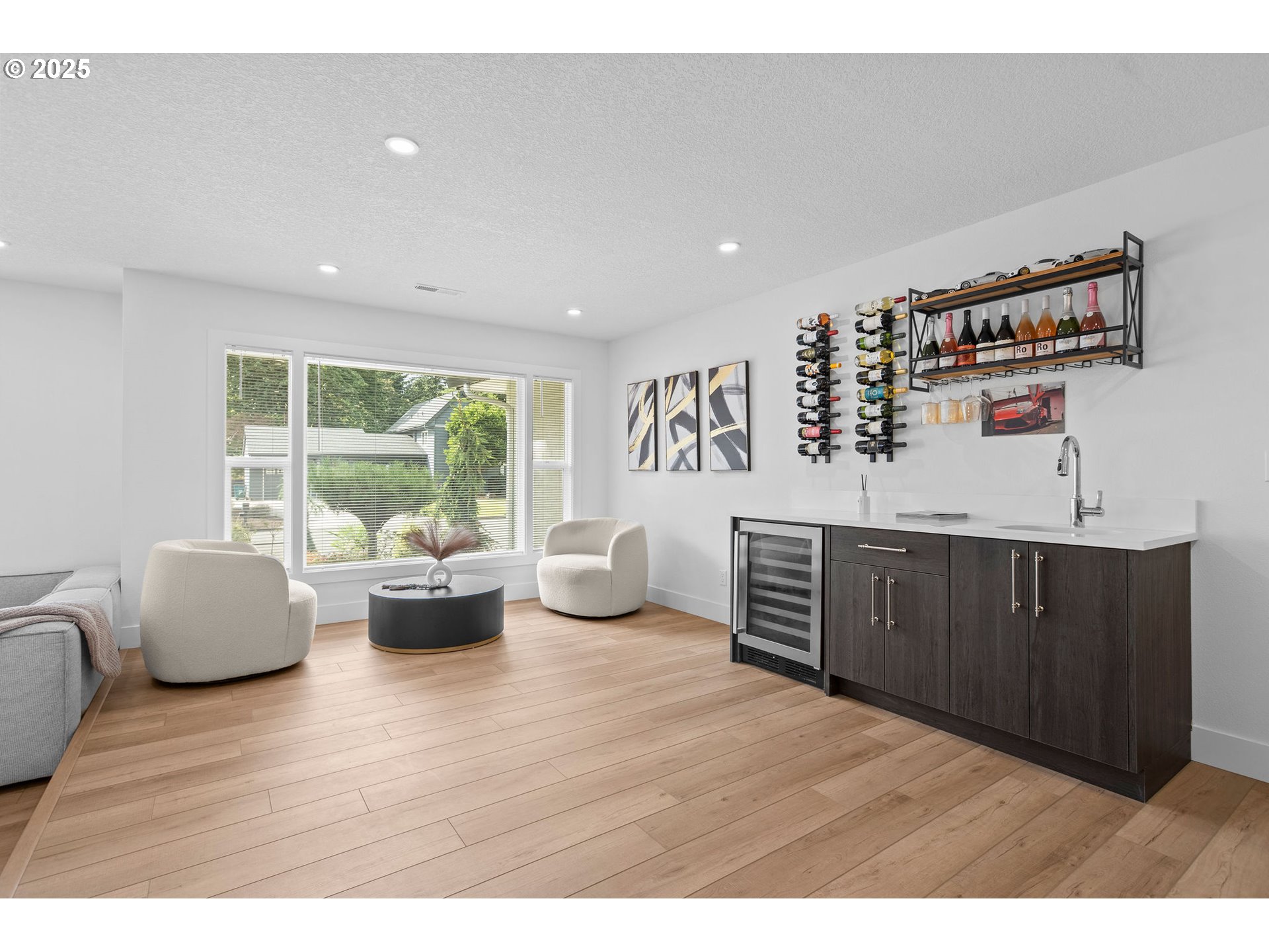207 Phoenix Way Vancouver, WA 98661 - Photo 11 of 48 a living room with furniture and wooden floor