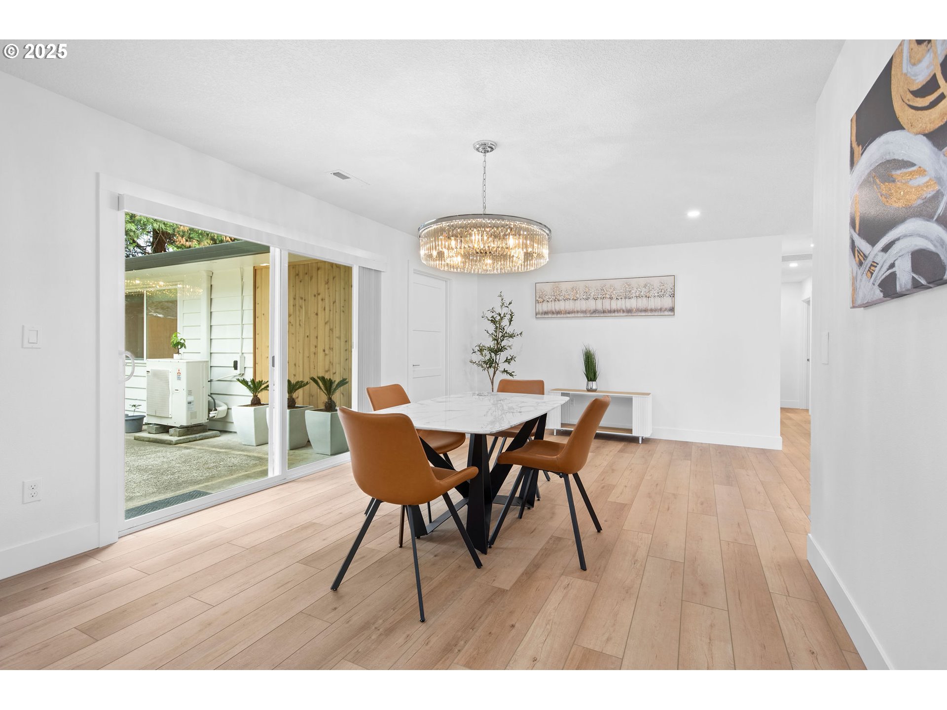 207 Phoenix Way Vancouver, WA 98661 - Photo 14 of 48 a view of a dining room with furniture window and wooden floor