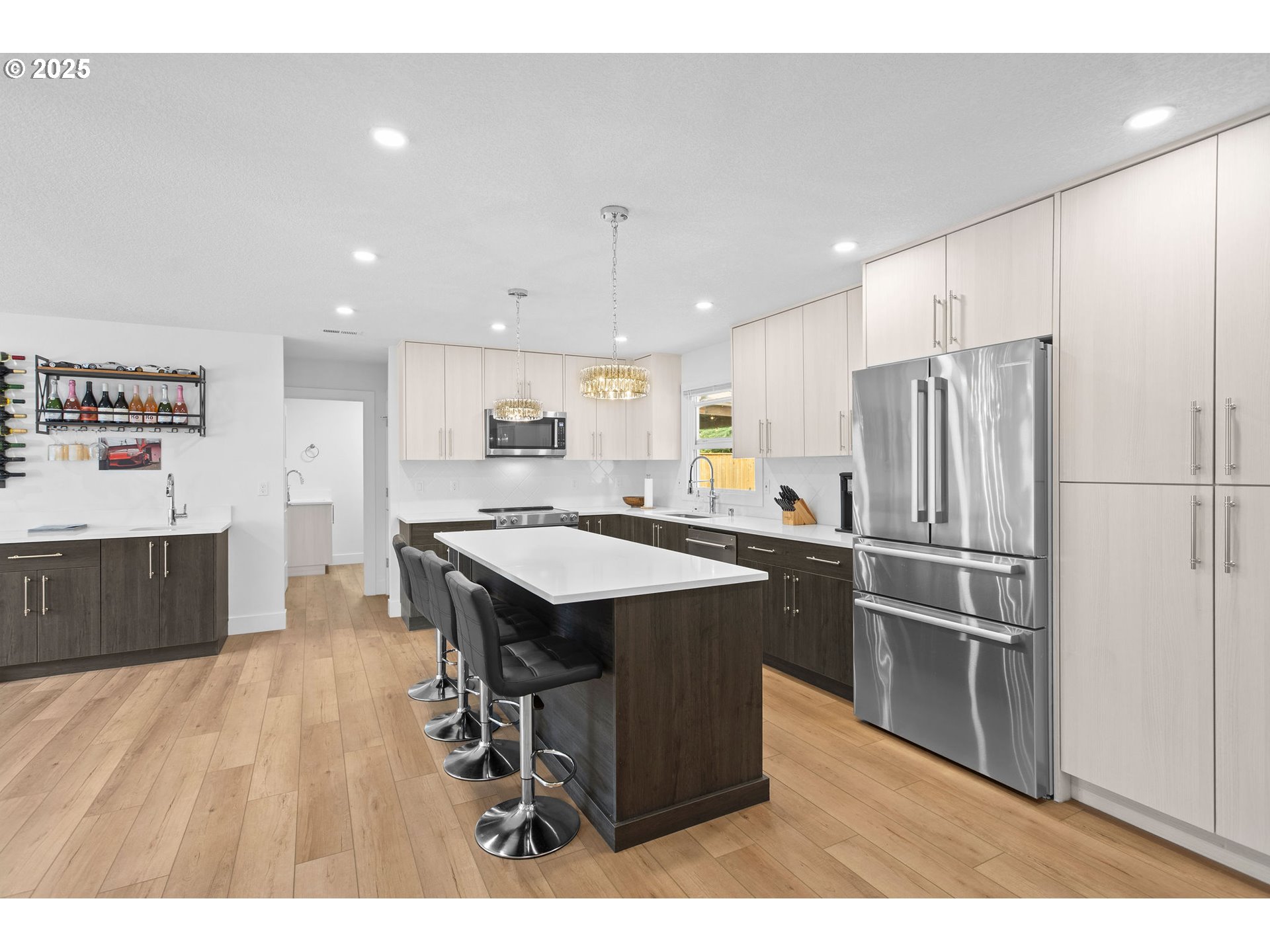 207 Phoenix Way Vancouver, WA 98661 - Photo 15 of 48 a kitchen with stainless steel appliances granite countertop a refrigerator a sink dishwasher and a stove with wooden floor