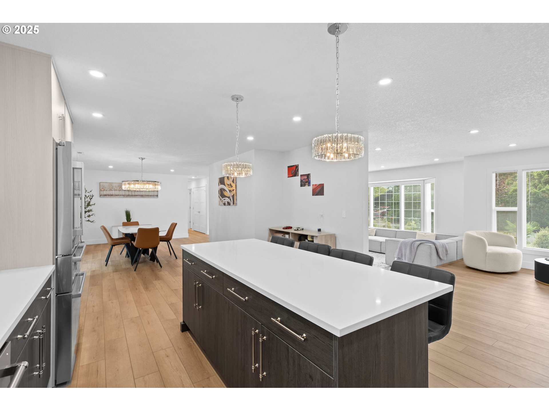 207 Phoenix Way Vancouver, WA 98661 - Photo 17 of 48 a kitchen that has a kitchen island furniture and a large window