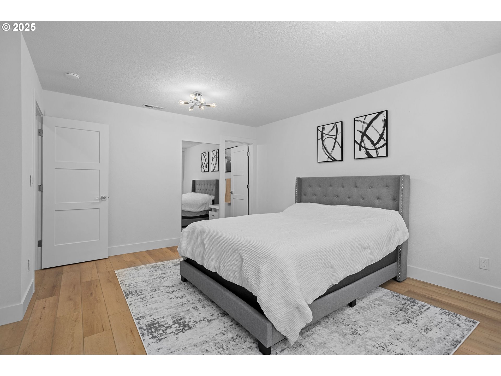 207 Phoenix Way Vancouver, WA 98661 - Photo 28 of 48 a bedroom with a bed and a table