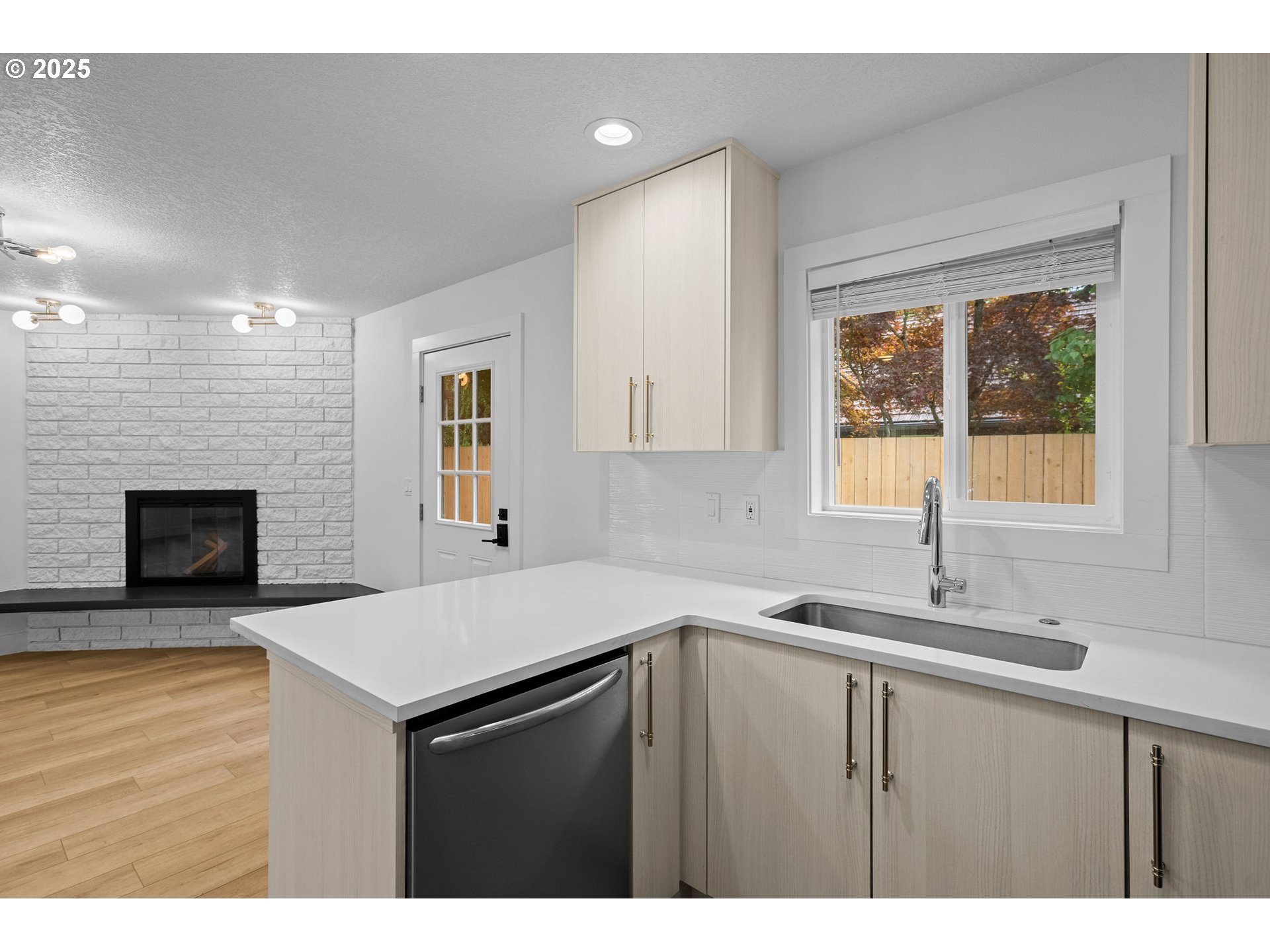 207 Phoenix Way Vancouver, WA 98661 - Photo 34 of 48 a kitchen with a sink cabinets and a window