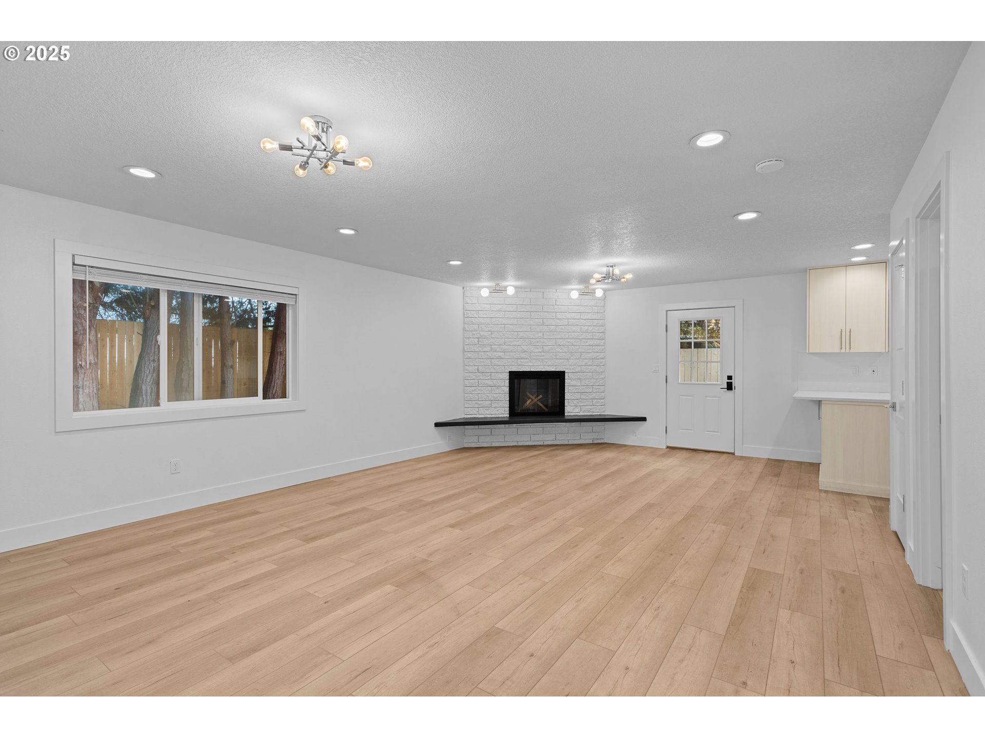 207 Phoenix Way Vancouver, WA 98661 - Photo 36 of 48 a view of an empty room with kitchen and window