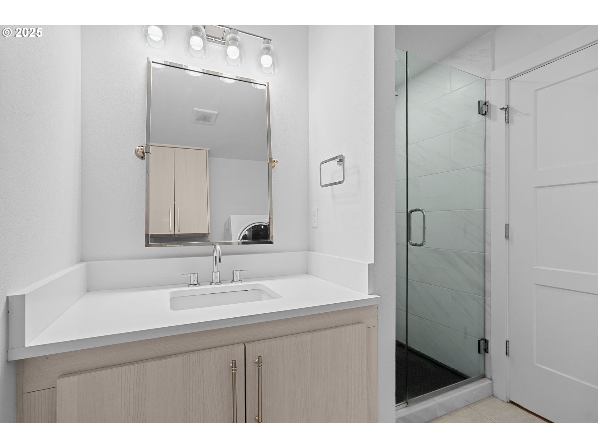 207 Phoenix Way Vancouver, WA 98661 - Photo 38 of 48 a bathroom with a sink mirror and a shower