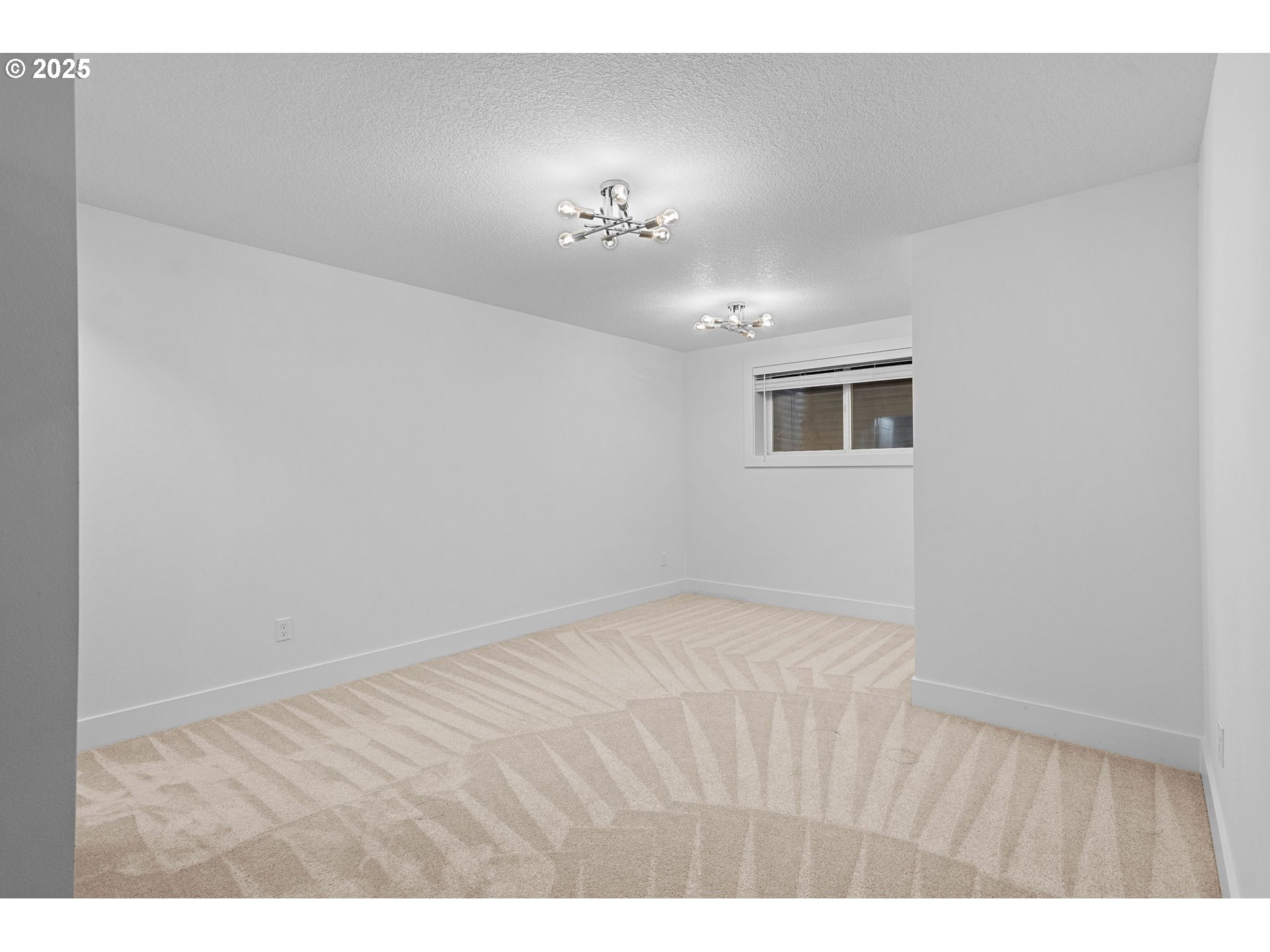 207 Phoenix Way Vancouver, WA 98661 - Photo 42 of 48 a view of an empty room with chandelier fan