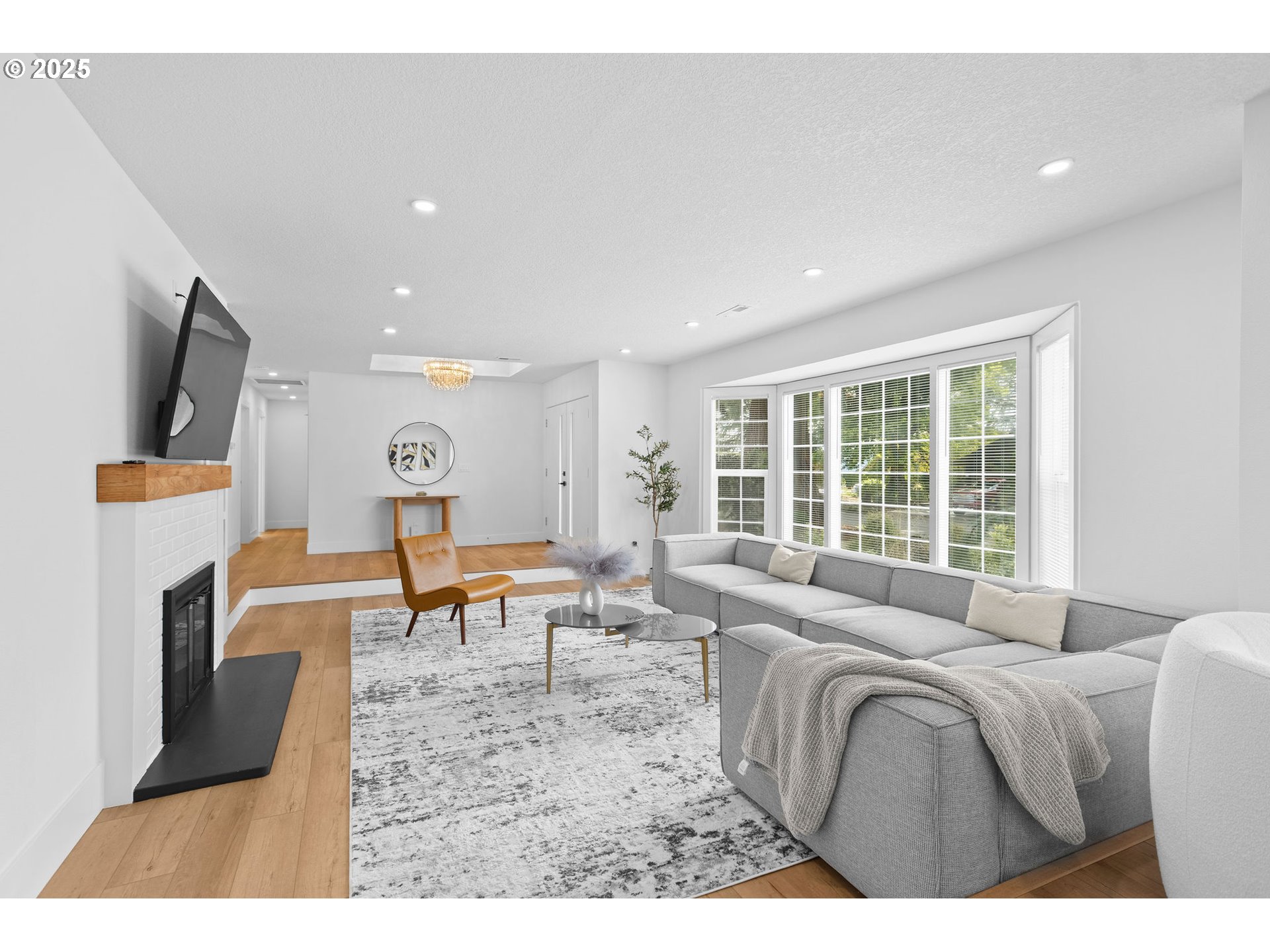 207 Phoenix Way Vancouver, WA 98661 - Photo 10 of 48 a living room with furniture and a flat screen tv