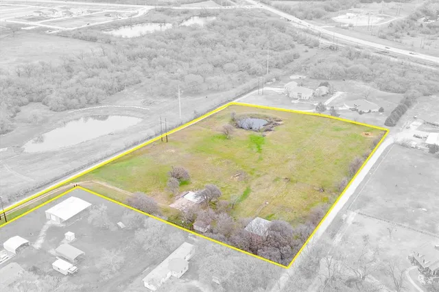 a view of a swimming pool and an outdoor space