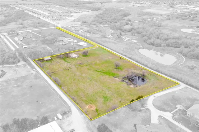 a view of swimming pool with a yard