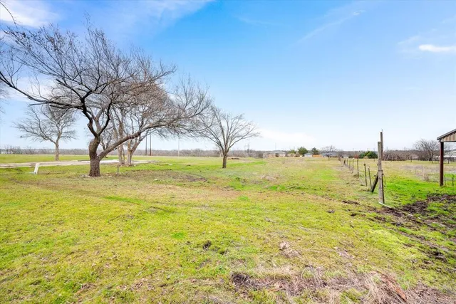 a view of a swimming pool and an outdoor space