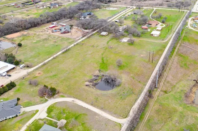 a view of swimming pool with a yard
