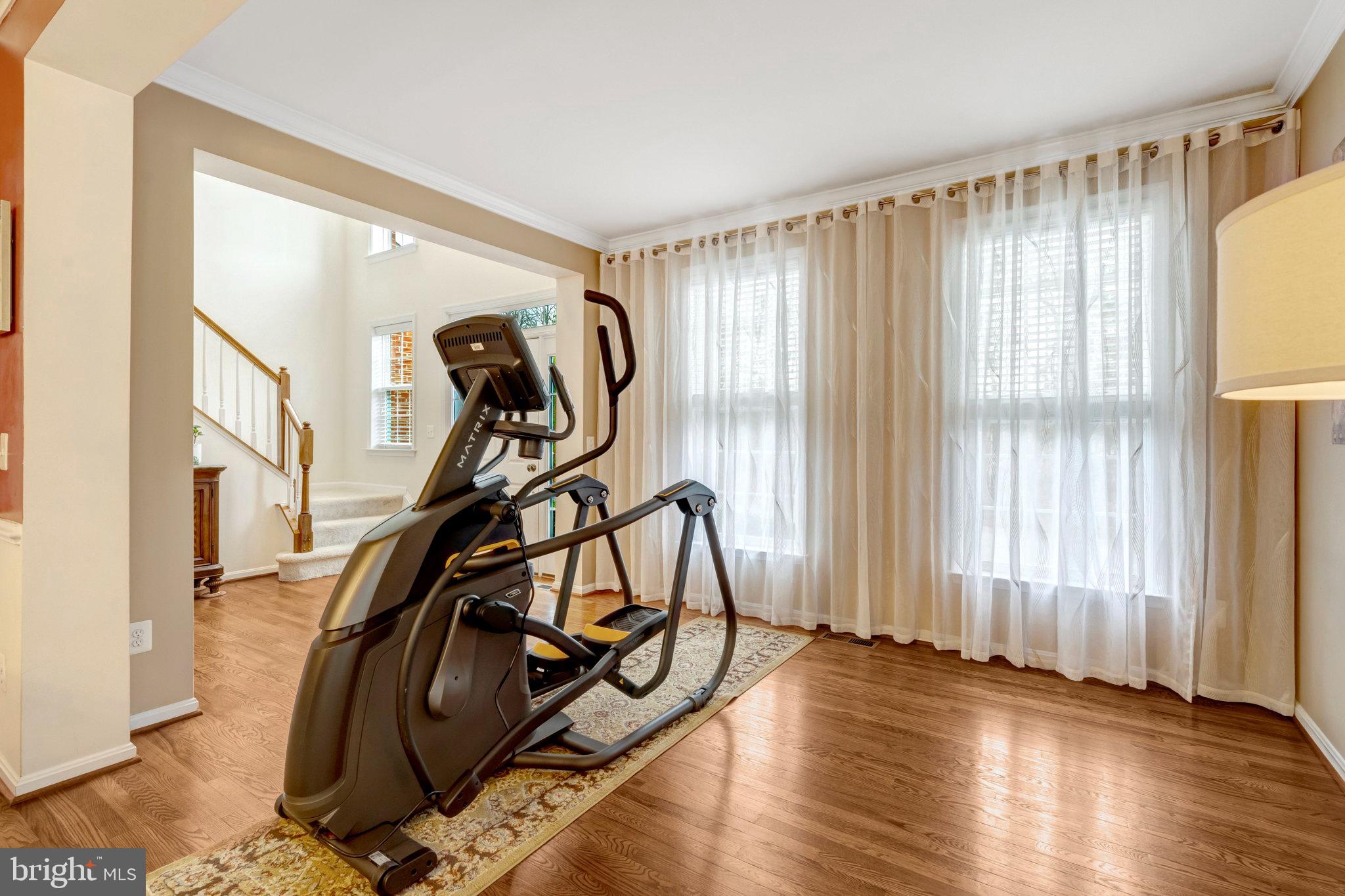 7726 Yalta Way Gainesville, VA 20155 - Photo 16 of 75 a view of a room with gym equipment