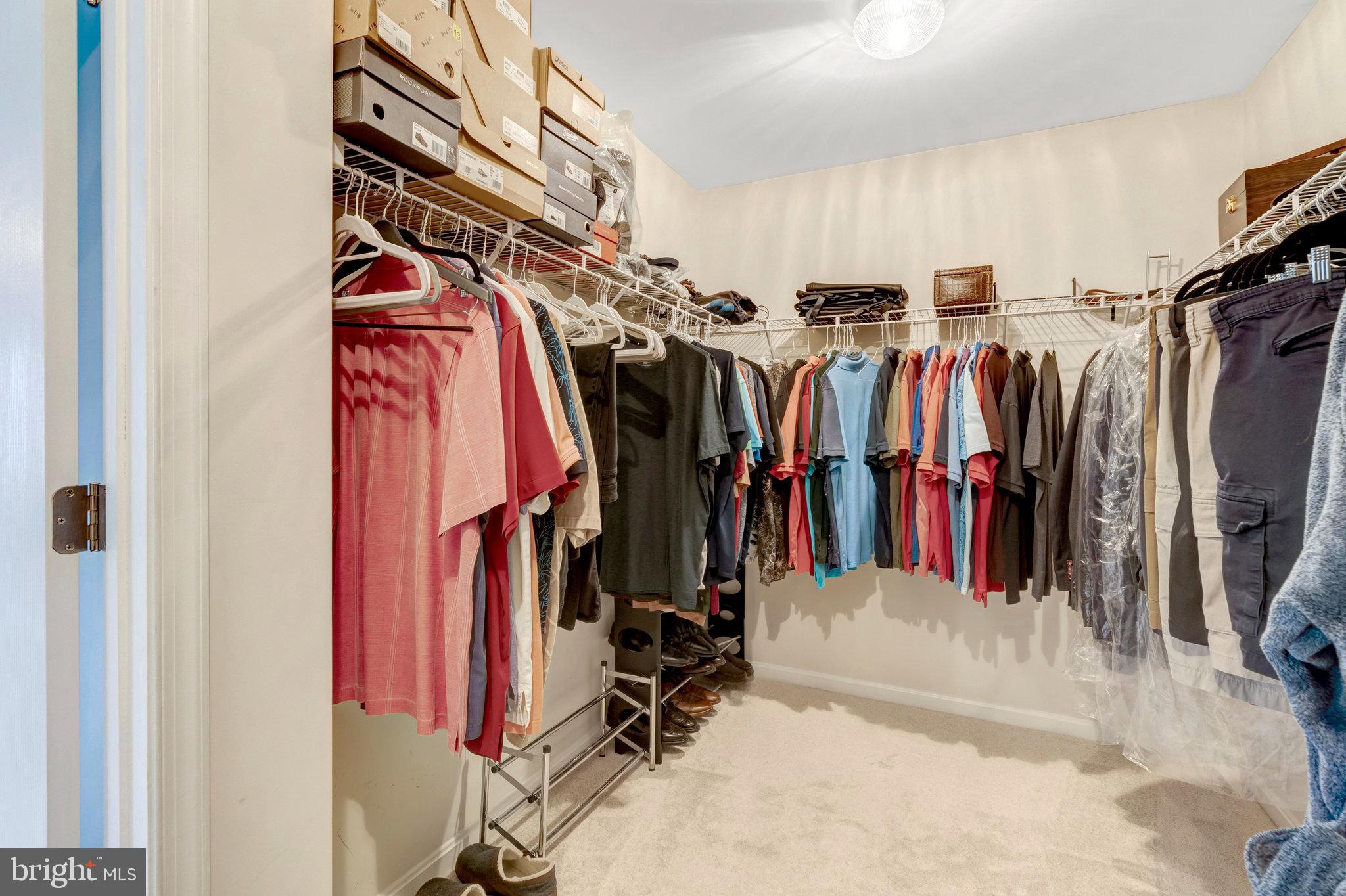 7726 Yalta Way Gainesville, VA 20155 - Photo 49 of 75 a view of walk in closet with clothes
