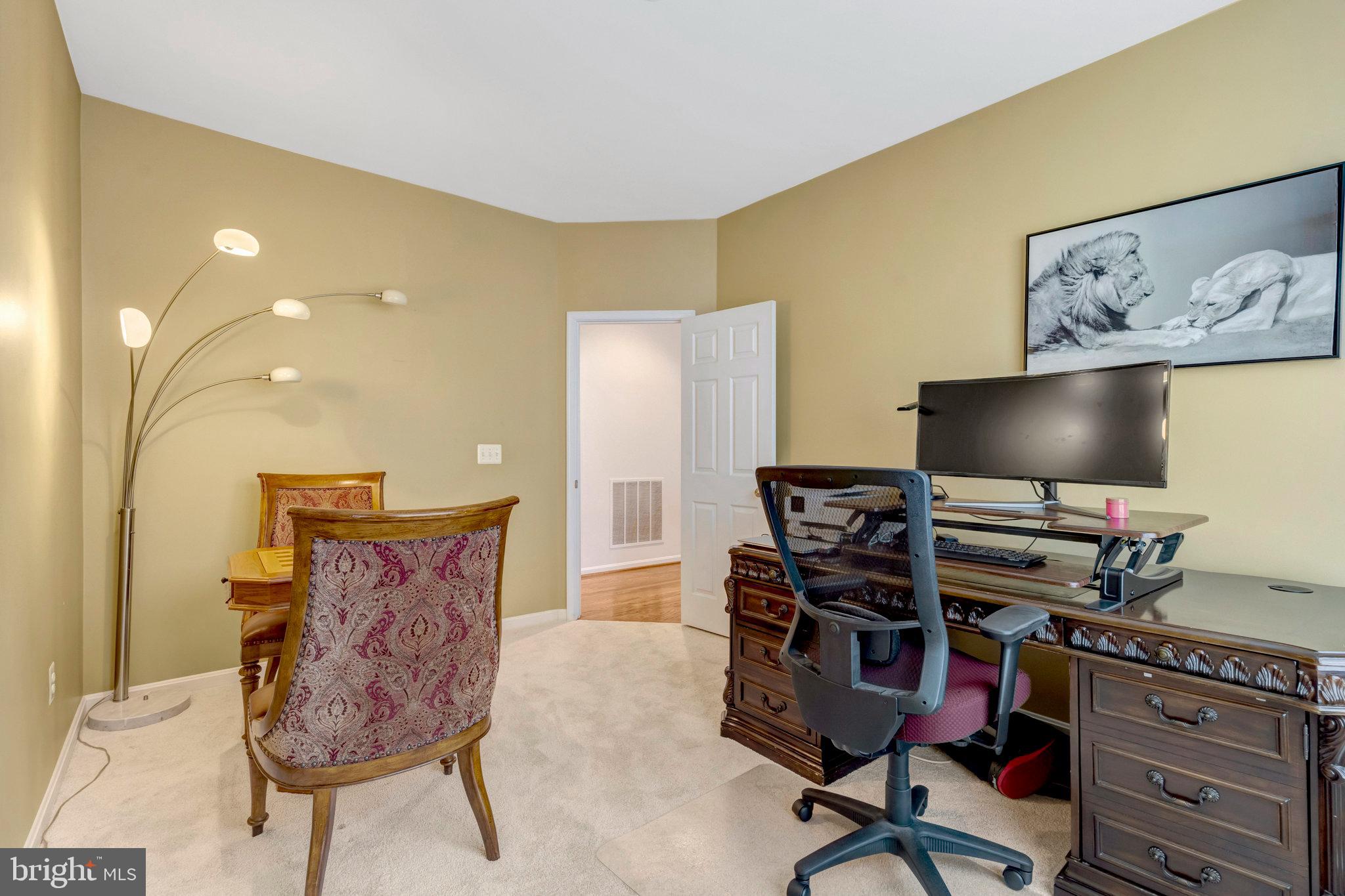 7726 Yalta Way Gainesville, VA 20155 - Photo 60 of 75 a view of a workspace with furniture