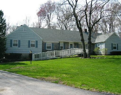 65 Salem Road Fairfield, CT 06824 - Photo 1 of 1 a backyard of a house with lots of green space