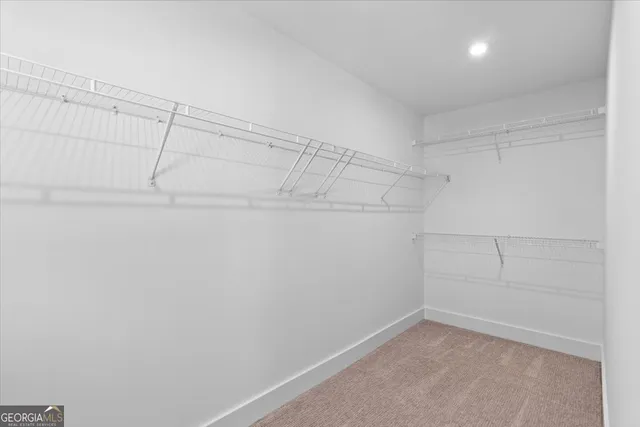 a view of a room with racks on the wall