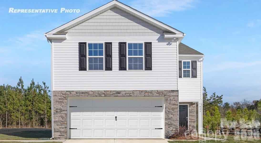 a view of house that has a window on the house