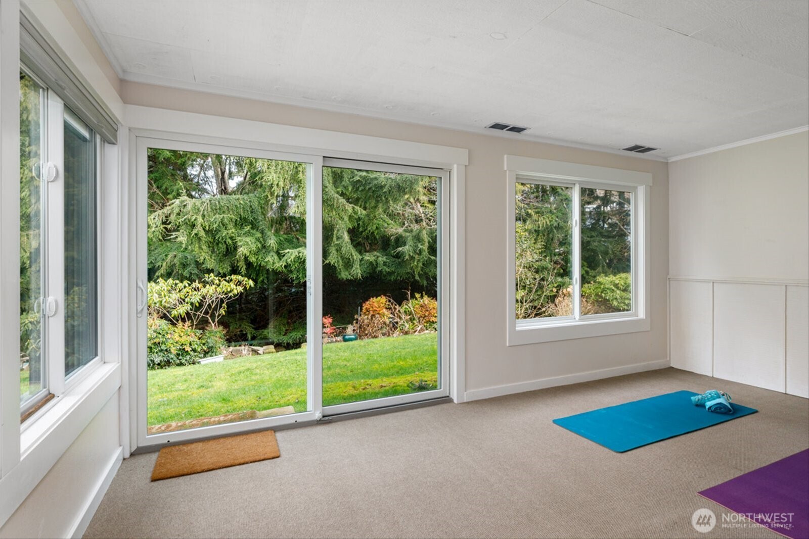 566 Creekside Terrace, Unit 101 Langley, WA 98260 - Photo 12 of 31 a view of an empty room with a window