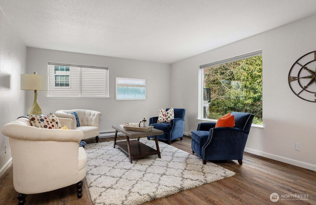 566 Creekside Terrace, Unit 101 Langley, WA 98260 - Photo 7 of 31 a living room with furniture and a window