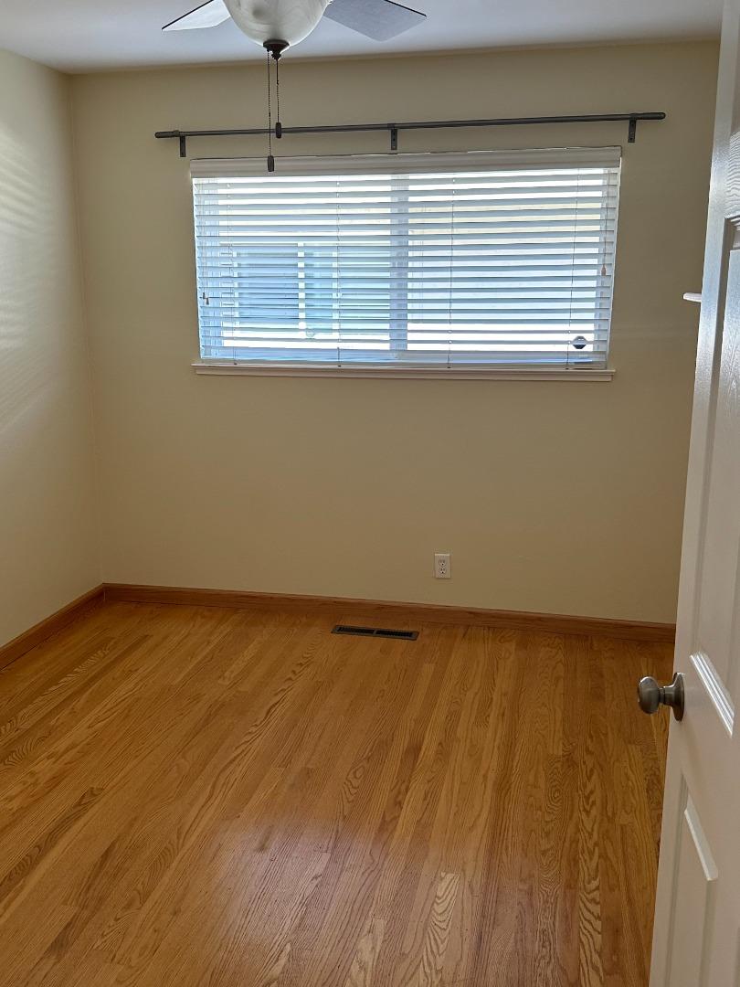 2046 Anthony Drive Campbell, CA 95008 - Photo 14 of 18 a view of an empty room with wooden floor and a window
