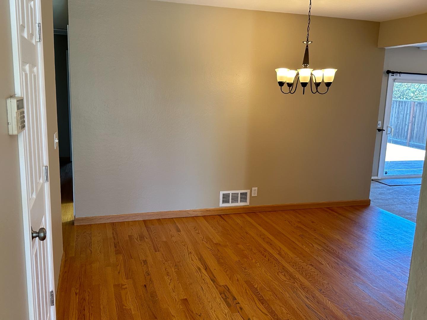 2046 Anthony Drive Campbell, CA 95008 - Photo 7 of 18 a view of an empty room with wooden floor